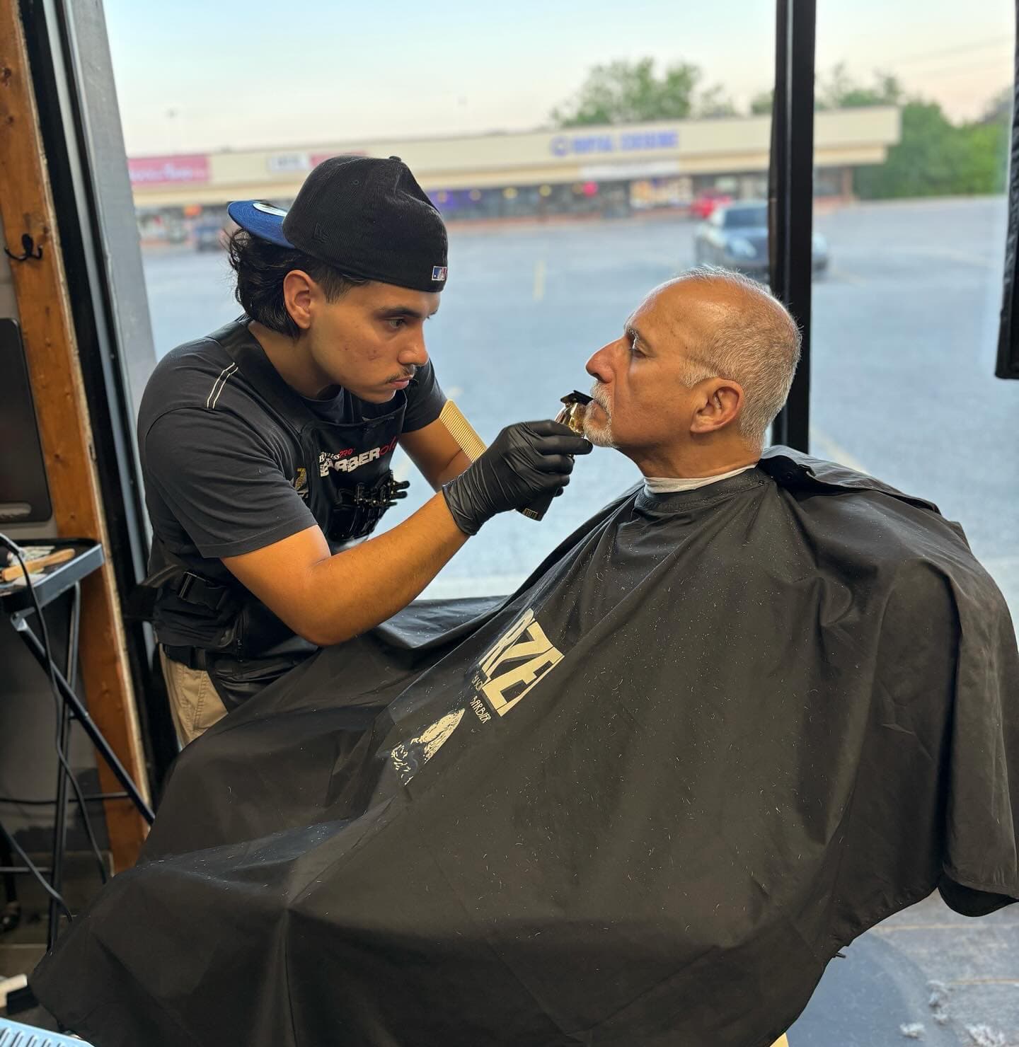 A precision fade cut by a barber at The Barber Lounge
