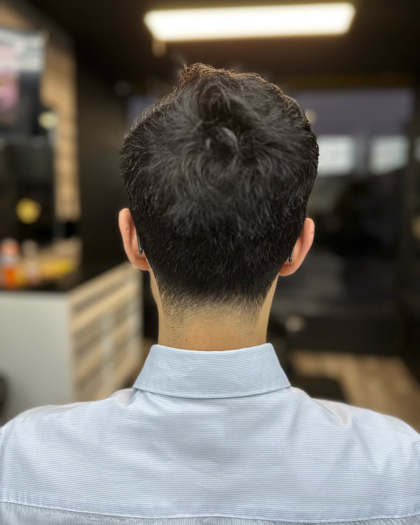 Clean simple haircut by Rahiem