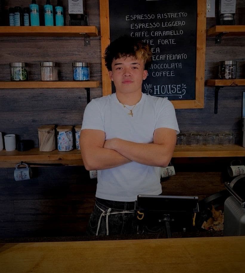 Dean Palmiery, senior barber, at the Victoria Rd coffee bar
