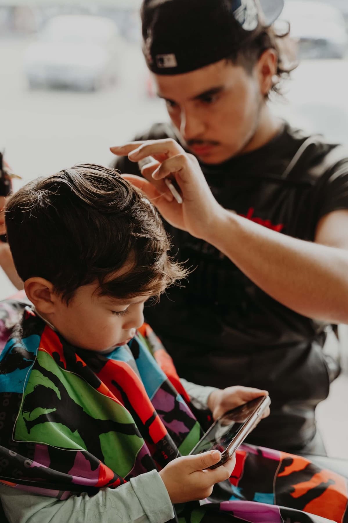 Jesse Neves mid-cut at the Victoria Rd shop